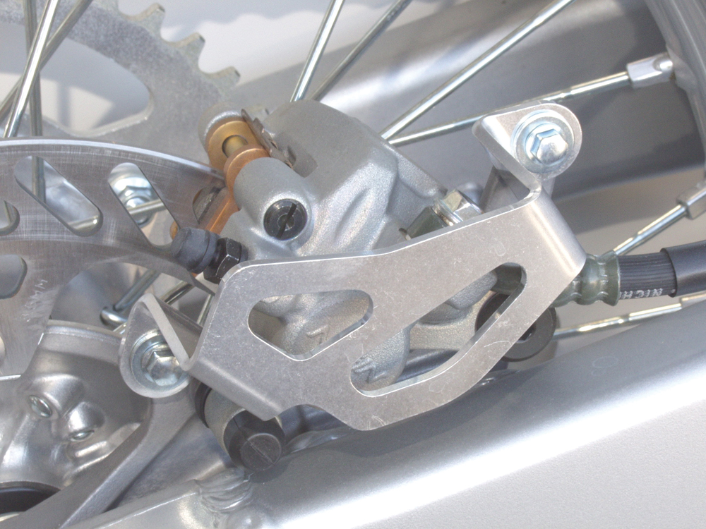 Works Connection Rear Caliper Guard Aluminum Fits 04-20 KX 250/450 - Click Image to Close